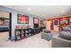 Finished basement with carpet, collectible figurines, sports memorabilia, and recessed lights at 455 Cooper Woods Se Ct, Smyrna, GA 30082