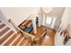 Grand foyer with hardwood floors, staircase, and elegant chandelier at 455 Cooper Woods Se Ct, Smyrna, GA 30082