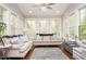 Sunroom with large windows offering plenty of natural light at 455 Cooper Woods Se Ct, Smyrna, GA 30082