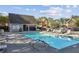 Community pool with lounge chairs and clear blue water perfect for relaxing on a sunny day at 507 Mirramont Pl, Woodstock, GA 30189