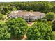 Exterior view of a large home with a beautiful green yard at 2374 Farmstead Cir, Smyrna, GA 30080