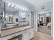 Bright primary bath with double vanity, large mirror and soaking tub at 3500 Lost Valley Dr, Jonesboro, GA 30236