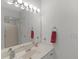 Bright bathroom with large mirror, updated vanity, and a glass-enclosed shower at 3500 Lost Valley Dr, Jonesboro, GA 30236