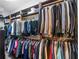 Organized walk-in closet with clothing racks and shelving at 3500 Lost Valley Dr, Jonesboro, GA 30236