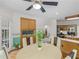 Bright breakfast nook features an aquarium and a beautiful view to the adjacent kitchen at 3500 Lost Valley Dr, Jonesboro, GA 30236