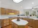Bright kitchen with a center island and backyard views from the breakfast nook at 3500 Lost Valley Dr, Jonesboro, GA 30236