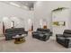 Open concept living room with plush seating and an aquarium at 3500 Lost Valley Dr, Jonesboro, GA 30236