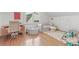 Bedroom with a desk, sofa and hardwood floors at 1216 Beech Valley Ne Rd, Atlanta, GA 30306