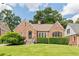 Charming brick home with manicured lawn and mature trees in desirable neighborhood at 1216 Beech Valley Ne Rd, Atlanta, GA 30306