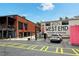 Exterior view of buildings with parking lot and signage for West End Brewery & Gardens at 1124 Larosa Sw Ter, Atlanta, GA 30310