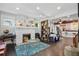 Inviting living room with a charming fireplace, hardwood floors, and a cozy atmosphere at 1124 Larosa Sw Ter, Atlanta, GA 30310