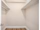 Walk-in closet with ample storage space and new flooring at 1132 Luther Sw Dr, Mableton, GA 30126