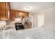 Modern kitchen boasts granite countertops, stainless steel appliances, and ample storage at 1132 Luther Sw Dr, Mableton, GA 30126