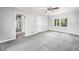 Bedroom with ceiling fan, wall to wall carpet and white trim at 3150 Rilman Nw Rd, Atlanta, GA 30327