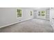 Bedroom with built-in shelving and large windows for ample natural light at 3150 Rilman Nw Rd, Atlanta, GA 30327