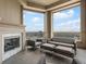 Cozy balcony with fireplace and comfortable seating overlooking the city skyline at 3376 Peachtree Ne Rd # 44B, Atlanta, GA 30326