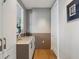 Modern bar area featuring a sink, white cabinets, and a contemporary design at 3376 Peachtree Ne Rd # 44B, Atlanta, GA 30326