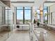 Bathroom with large windows providing city views, walk-in shower, and dual sink vanity at 3376 Peachtree Ne Rd # 44B, Atlanta, GA 30326