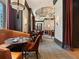 Elegant restaurant dining area with booth seating, stylish lighting, and sophisticated decor at 3376 Peachtree Ne Rd # 44B, Atlanta, GA 30326