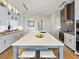 Modern kitchen featuring a large island, sleek cabinetry, and high-end appliances at 3376 Peachtree Ne Rd # 44B, Atlanta, GA 30326