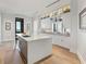 Modern kitchen with a large island, stainless steel appliances, and ample cabinet space at 3376 Peachtree Ne Rd # 44B, Atlanta, GA 30326