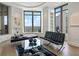 Bright living room featuring contemporary seating, large windows, and city views at 3376 Peachtree Ne Rd # 44B, Atlanta, GA 30326