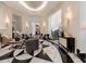 Luxurious lobby area with modern furniture, artful decor, and black and white flooring at 3376 Peachtree Ne Rd # 44B, Atlanta, GA 30326