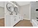 Bright bathroom with double sinks and modern fixtures at 486 Edward Ct, Marietta, GA 30066