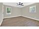 Spacious bedroom with hardwood floors and a ceiling fan at 486 Edward Ct, Marietta, GA 30066
