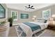 Cozy bedroom featuring a plush bed, bright windows, and a calming color scheme at 486 Edward Ct, Marietta, GA 30066