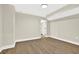 Spacious bedroom with natural light and laminate flooring at 486 Edward Ct, Marietta, GA 30066