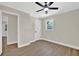 Cozy bedroom with hardwood floors, neutral walls, and plenty of natural light at 486 Edward Ct, Marietta, GA 30066
