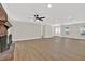 Spacious living room with hardwood floors, a fireplace, and ample natural light at 486 Edward Ct, Marietta, GA 30066