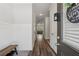 Inviting foyer with hardwood floors, a coat rack, and bright lighting leading into the living area at 8609 Lakeview, Jonesboro, GA 30238