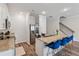 Contemporary kitchen with stainless steel appliances, granite countertops and bar stool seating for casual dining at 8609 Lakeview, Jonesboro, GA 30238
