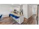 Stylish kitchen featuring a granite island with bar seating and stainless appliances, with ample room at 8609 Lakeview, Jonesboro, GA 30238