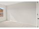 This bedroom features neutral carpeting and a window providing natural light at 122 Parkview Dr, Dallas, GA 30157