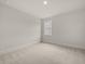 Neutral bedroom featuring a carpet and a window with a view at 122 Parkview Dr, Dallas, GA 30157