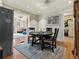 Dining area showcasing a round dining table and chairs with a view into the living room at 1480 Niskey Lake Sw Rd, Atlanta, GA 30331