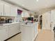 Well-lit kitchen boasting an island and ample cabinet space at 1480 Niskey Lake Sw Rd, Atlanta, GA 30331