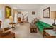 Comfortable living room with classic decor and a bright green sofa at 1480 Niskey Lake Sw Rd, Atlanta, GA 30331
