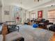 Bright living room filled with natural light, chandelier, and a view of trees at 1480 Niskey Lake Sw Rd, Atlanta, GA 30331
