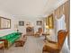Inviting living room with decorative drapes and a view to the dining room at 1480 Niskey Lake Sw Rd, Atlanta, GA 30331