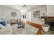 Living room with fireplace, natural light, hardwood floors, and neutral furniture at 239 Devonwood Dr, Atlanta, GA 30328