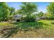Spacious backyard features mature trees and a detached garage at 2921 Huntcliff Dr, Marietta, GA 30066