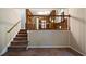 Basement area featuring stairs leading to an upper level and views into the kitchen area at 2921 Huntcliff Dr, Marietta, GA 30066