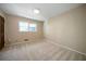 Bedroom showcasing carpet and light filled window at 2921 Huntcliff Dr, Marietta, GA 30066