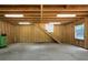 Unfinished garage space showing the wooden frame, a ladder to an upper space, and an exterior window at 2921 Huntcliff Dr, Marietta, GA 30066