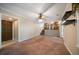 Large living area with access to the kitchen and views of the backyard through windows at 2921 Huntcliff Dr, Marietta, GA 30066