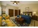 Bedroom featuring hardwood floors, ceiling fan, and ensuite bathroom with shower at 2921 Huntcliff Dr, Marietta, GA 30066